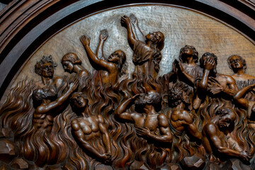 Wood sculpture (19th century) of Souls in purgatory fire waiting for the salvation of their souls.