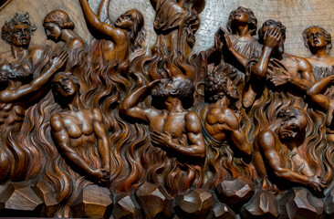 Wood sculpture (19th century) of Souls in purgatory fire waiting for the salvation of their souls.