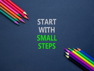 Start with small steps symbol. Concept words phrase Start with small steps on beautiful paper....