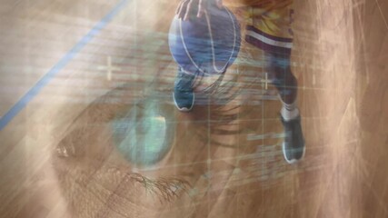 Male teen dribbling basketball on gym court, blending code overlays and tech grid lines - Powered by Adobe