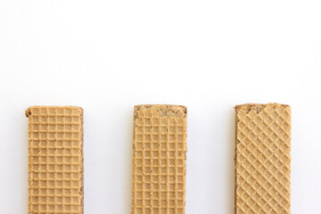 Tasty chocolate wafer biscuits isolated on white background.