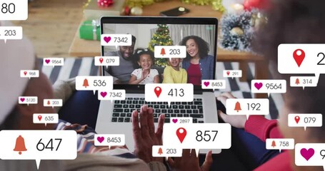 Two viewers waving and using trackpad at home, showing laptop technology call with floating icons - Powered by Adobe