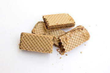 Tasty chocolate wafer biscuits isolated on white background.