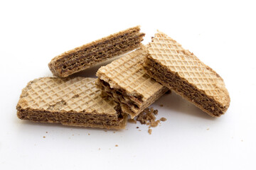Tasty chocolate wafer biscuits isolated on white background.