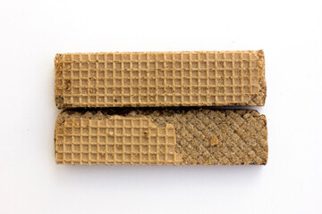 Tasty chocolate wafer biscuits isolated on white background.