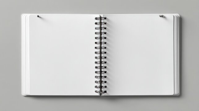 Opened blank spiral-bound notebook - Powered by Adobe