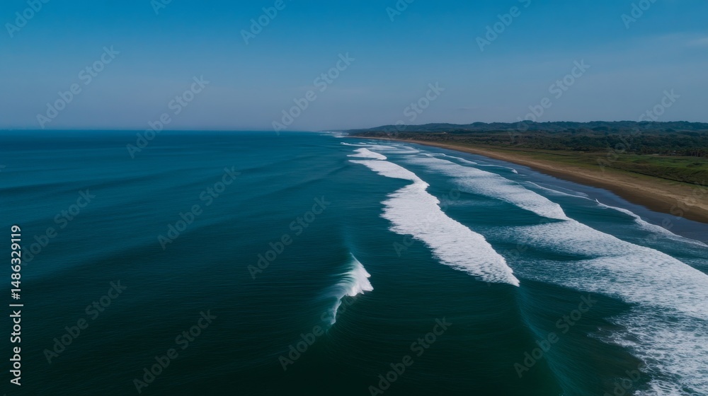 Poster turquoise waves crash against each other, forming white foam patterns while the deep blue sea extend