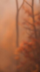 A warm autumnal texture with soft, blurred tones of orange, amber, and deep brown blending into a cozy haze.6