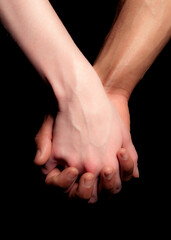 close up of a couple holding hands