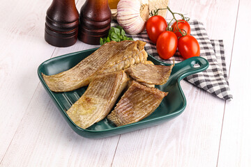 Baked stingray witngs with oil