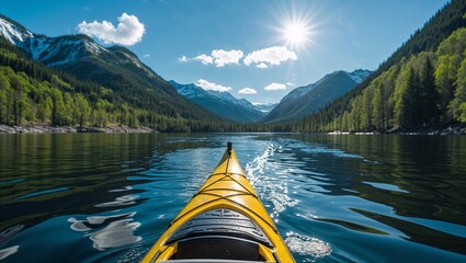 A yellow kayak on a serene lake surrounded by mountains and lush green forests under a bright sky