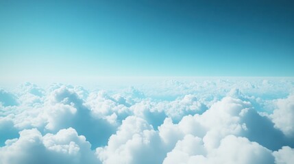 Fototapeta premium Aerial view of white cumulus clouds under light blue sky high altitude flight