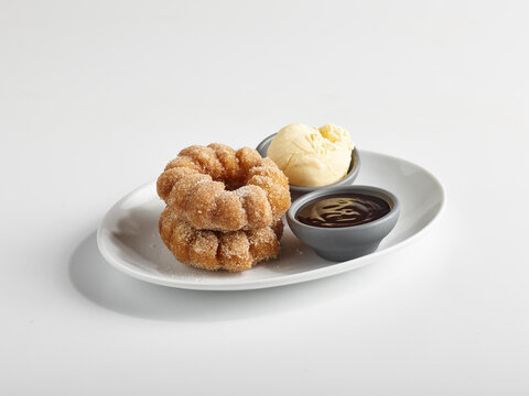 Churro donuts with dipping sauce