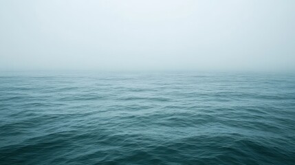 Fototapeta premium Calm ocean fog misty water sea horizon nature background