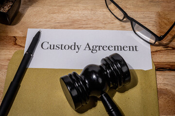 Custody Agreement Document with Gavel on Desk – Legal Child Custody Concept