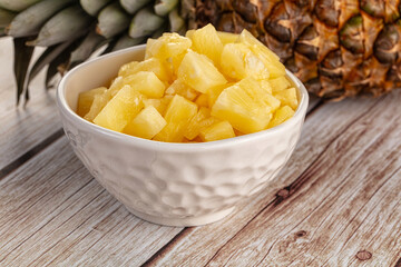 Sweet canned pineapple fruit pieces