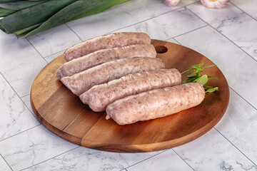Raw pork sausages for grill
