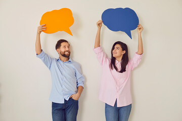 Plakat Young happy couple with paper speech balloons above, man, woman pair happy communication, dialog. People convey information, express feeling, good conversation, discourse, chatting in close relations