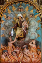 Sculpture (19th century) of Mary and Jesus giving the scapular to deliver souls from purgatory.