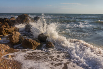 Waves of rocks on the sea shore