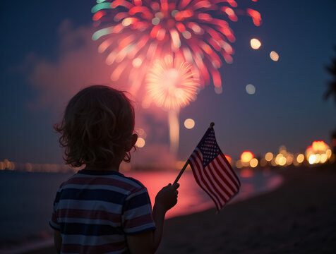 Child watching fireworks holding american flag beach night