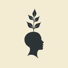 Abstract silhouette of a head with growing leaves on top  