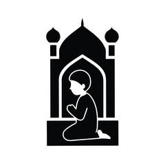 Muslim boy praying in mosque silhouette