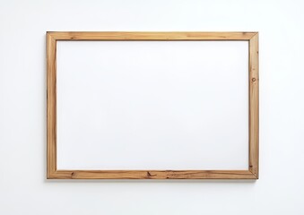 Rectangular light brown wooden picture frame against a plain white wall.  It is a simple, minimalist, and neutral-toned frame