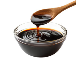 A Wooden Spoon Drizzling Thick, Dark Soy Sauce into a Clear Glass Bowl, Creating a Swirling Pattern, Isolated on Transparent and White Background
