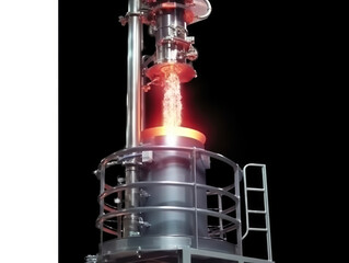 Industrial process with glowing material ejected,  metallic machinery