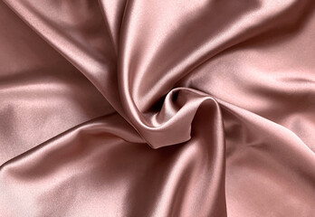 Light soft pastel pale dusty gentle powder brown beige nude silk satin fabric material. Luxury elegant background. Design. Wave line crumpled swirl.