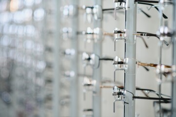 Eyeglasses frames displayed in an optometry store promoting eye health and vision care