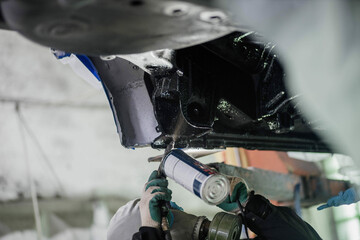 treatment of the car body bottom with anti-corrosion compound