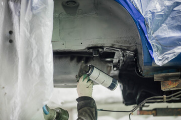 treatment of the car body bottom with anti-corrosion compound