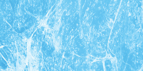 Abstract frozen water surface with subtle cracks and textured blue background illustrating winter coldness and natural beauty