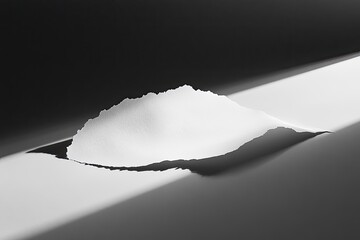 Ripped white paper, light beam