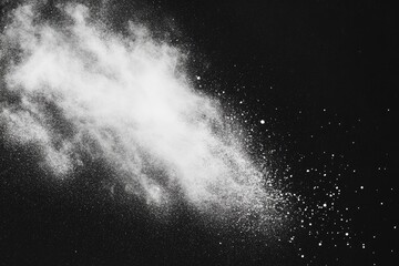 Abstract white powder explosion on black background