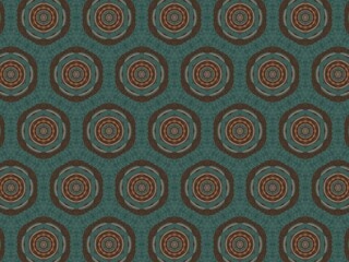 Fototapeta premium A repeating pattern of circular, mandala-like designs in muted teal, brown, and orange tones. The pattern is symmetrical and creates a textured effect.