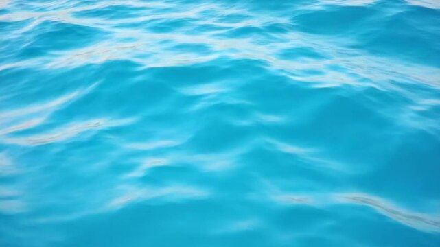 a blue wave of water is moving across the surface