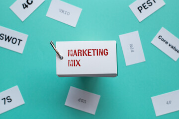 There is word card with the word Marketing Mix. It is as an eye-catching image.