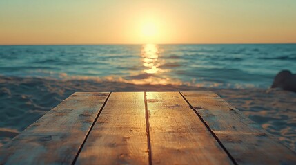 Fototapeta premium Empty wooden table on tropical beach, golden light, calm blue ocean in the backdrop