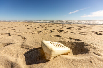 Polliution of the environment: Left behind garbage at a beach in france