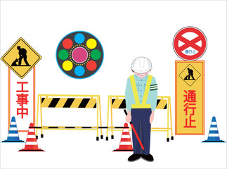 工事現場で交通誘導員が車を誘導している。