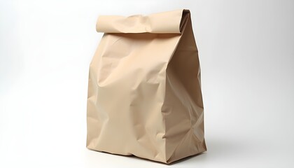 Naklejka premium A brown paper bag on a plain light background