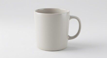 Obraz premium Simple Beige Mug on White Background - Stock Photo