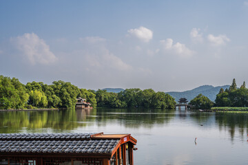 Serene Lakeside Houseboats in a Chinese Landscape