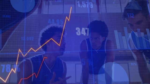 Three basketball players leaning in huddle on gym court, showing finance line, bar and pie overlays - Powered by Adobe