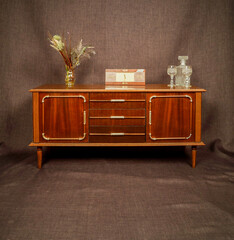 wooden vintage furniture on grey background