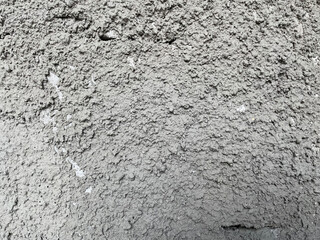 Rough gray cement plaster wall texture. gray cement wall background rough motif