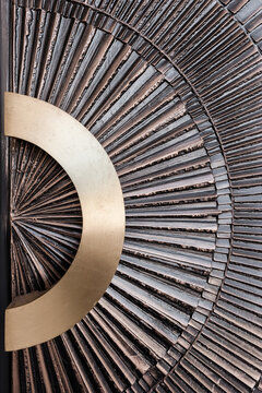 ornate metal door with circle pattern